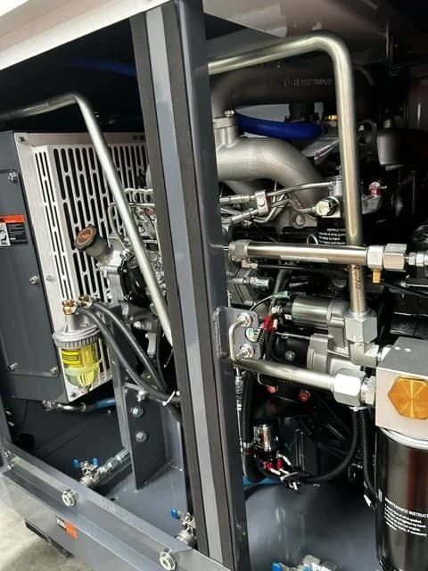 190CFM skid compressor Isuzu diesel engine bay detail